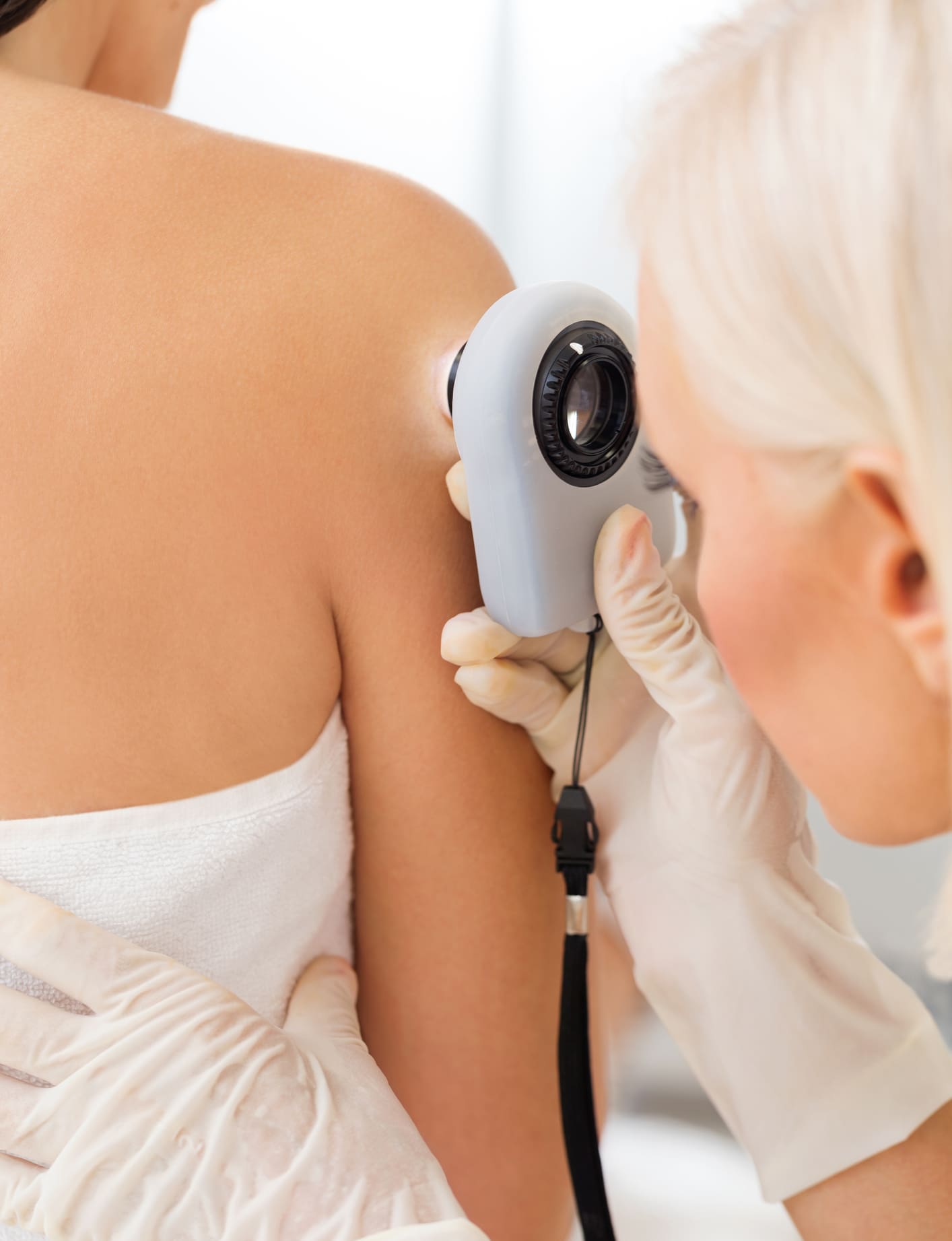 Dermatologist checking for skin cancer Skin Screening in Phoenix, AZ